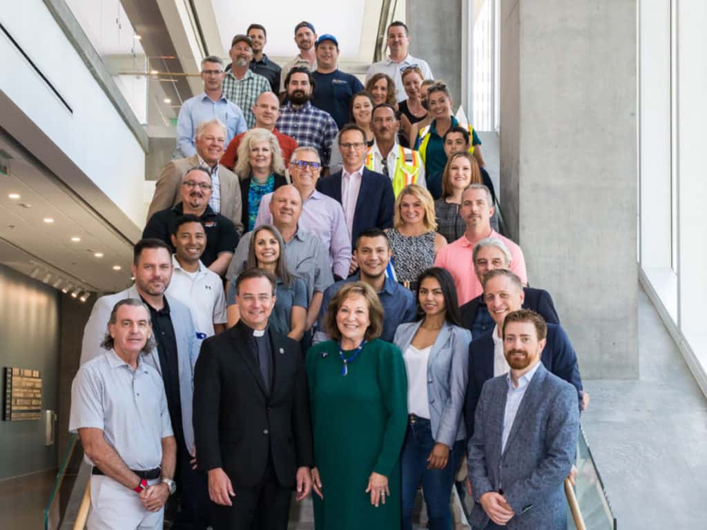 team of employees in an office building together