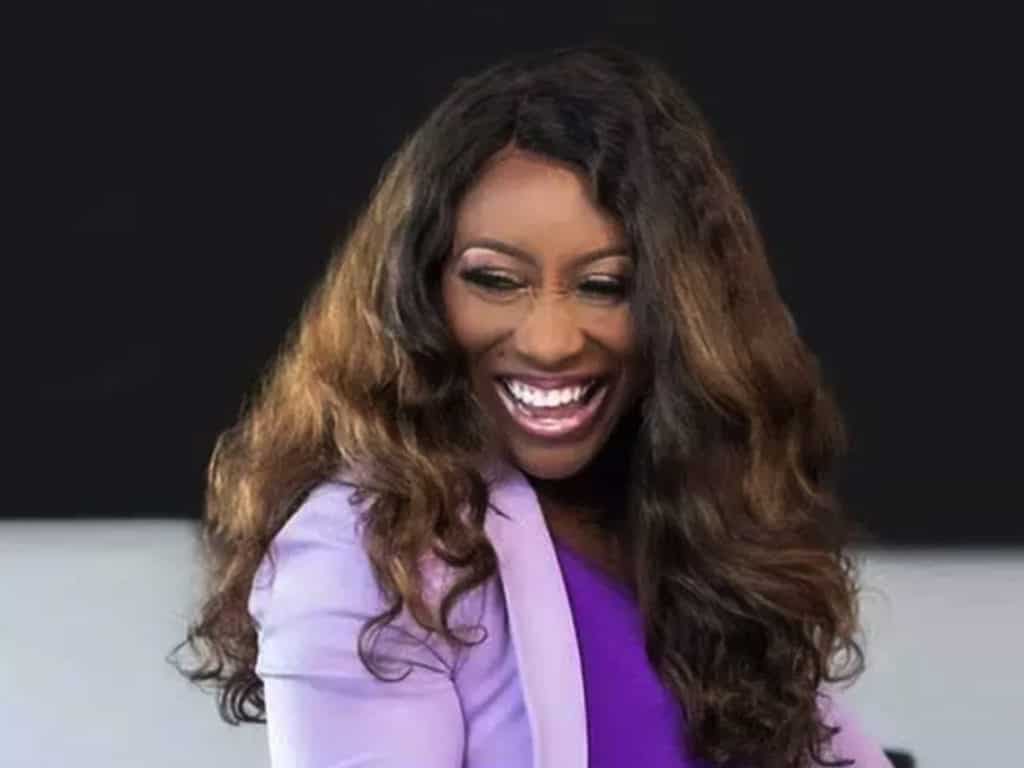 business women in a consulting group smiling