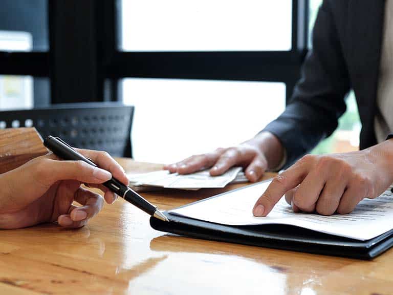 Real Estate Brokers signing an agreement