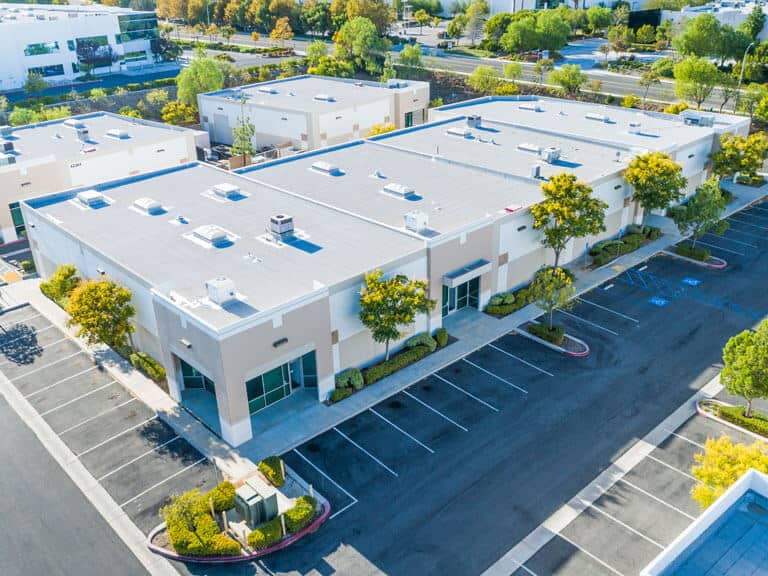 aerial view of industrial office building, a profitable commercial real estate investments